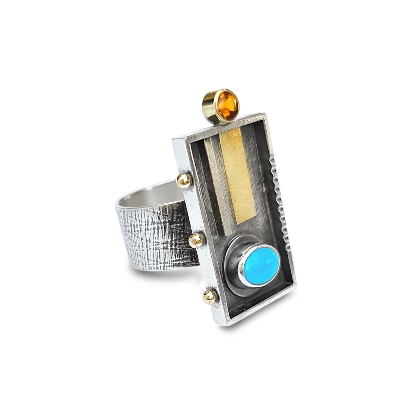 Silver ring with a blue gemstone and gold accents on a white background