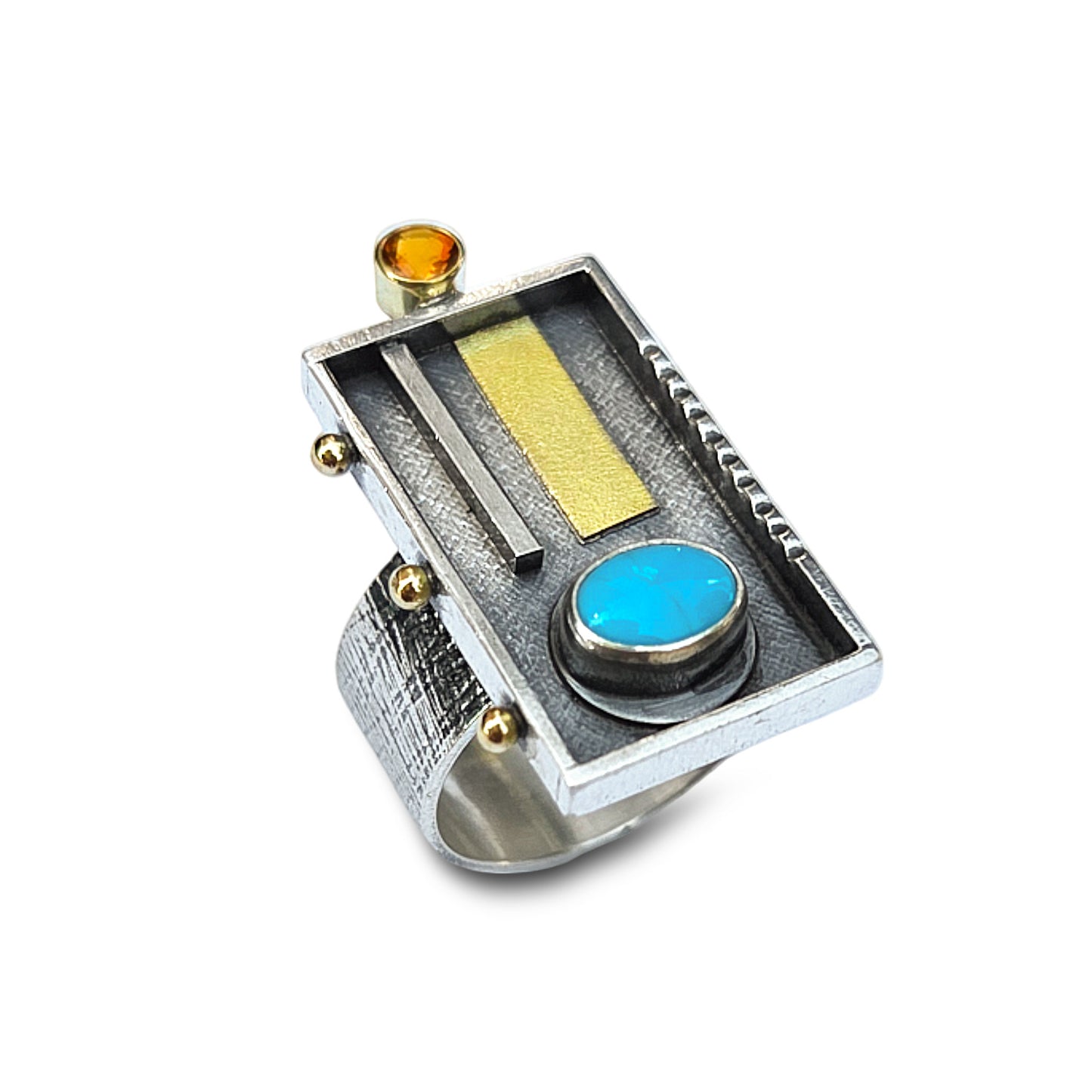 Silver ring with turquoise stone and gold accents on a white background