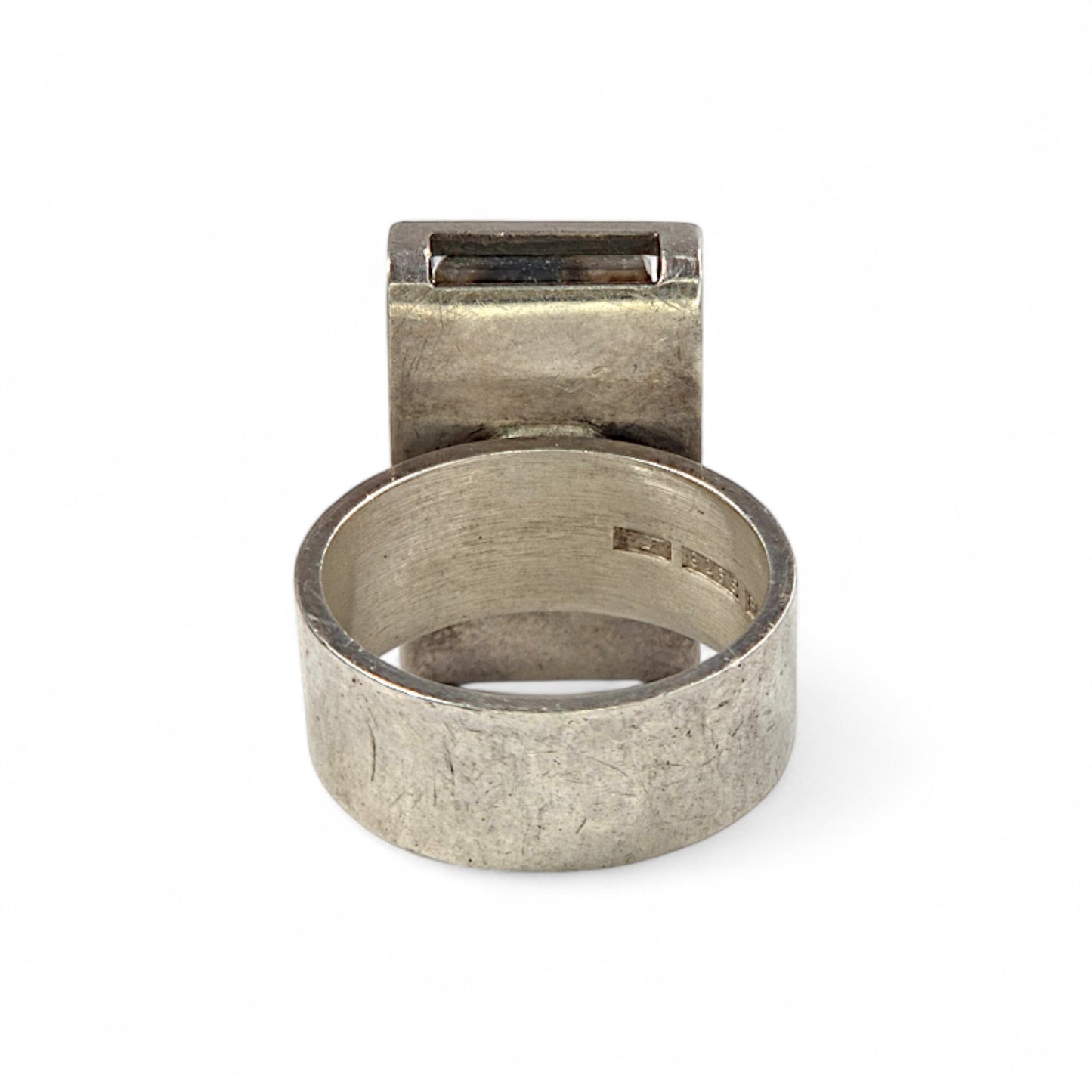 Silver ring with on a white background