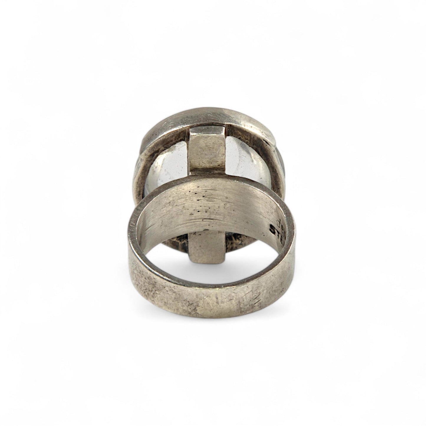 Silver ring on a white background
