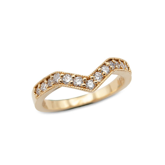 Gold ring with diamonds on a white background