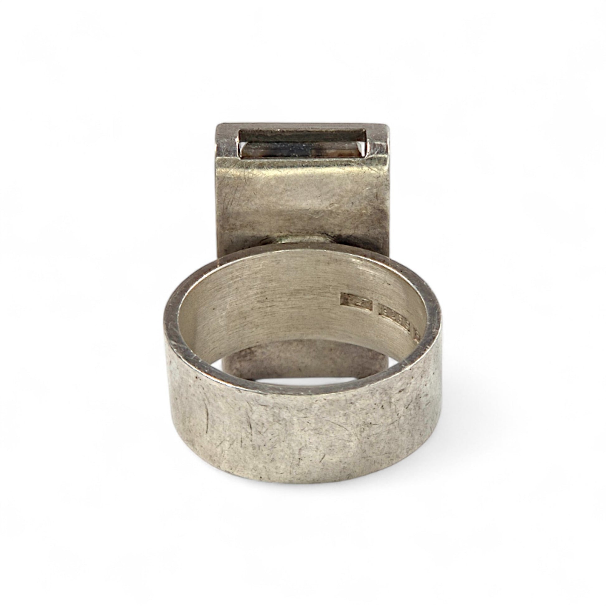 Silver ring with on a white background