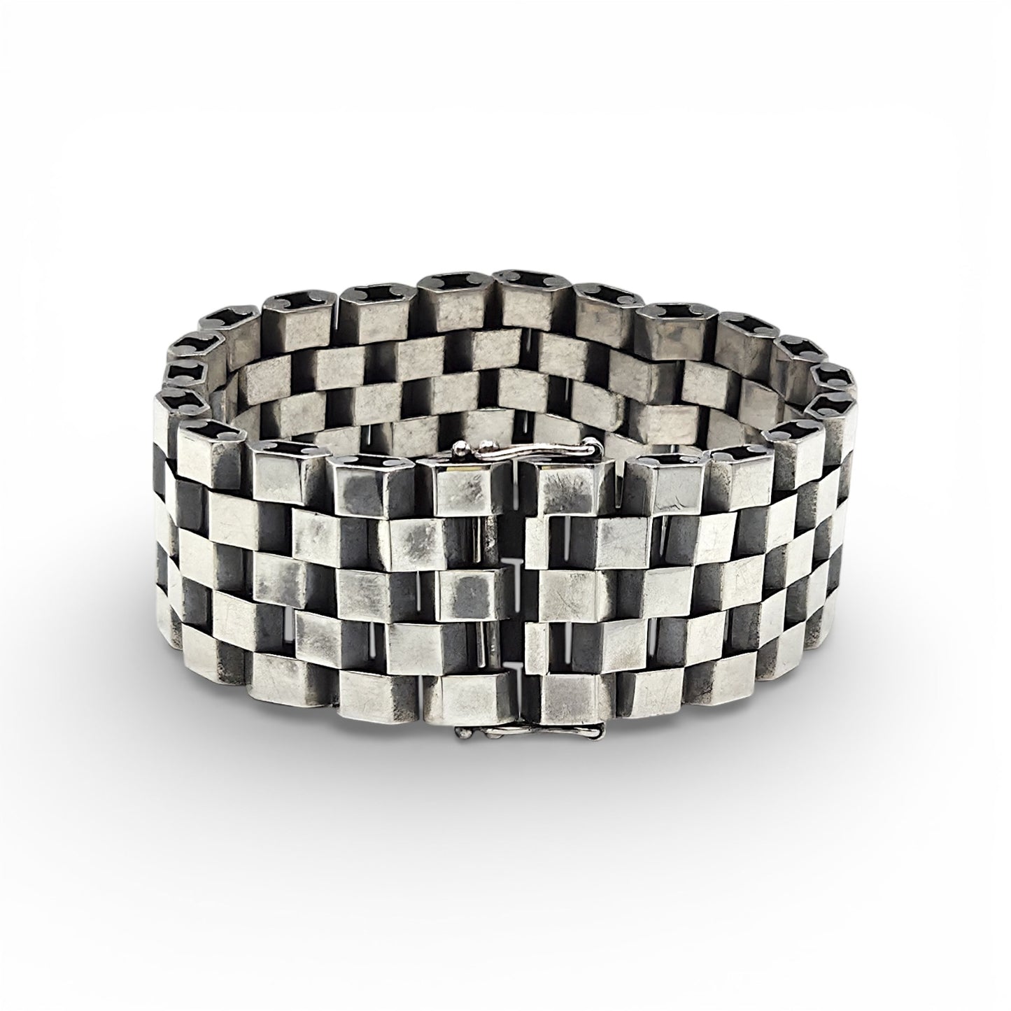 Silver checkered bracelet on a white background