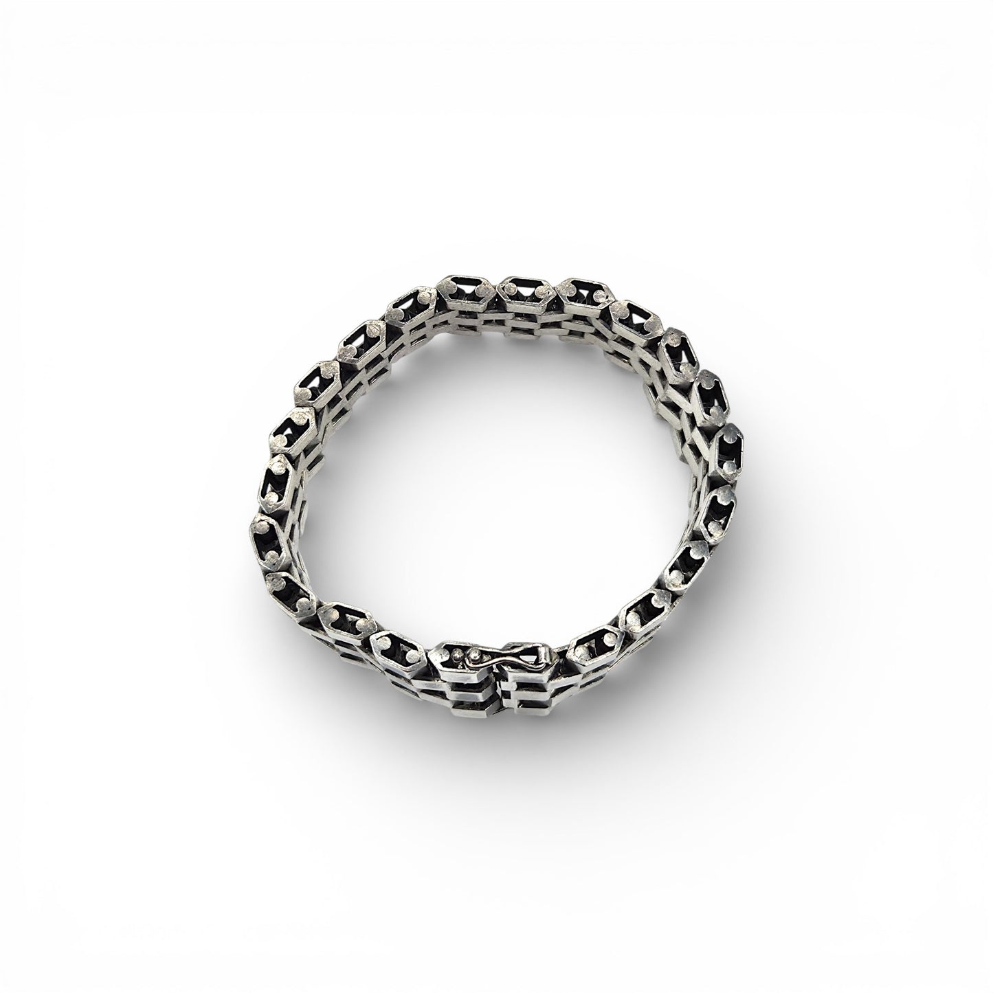 Silver checkered bracelet on a white background