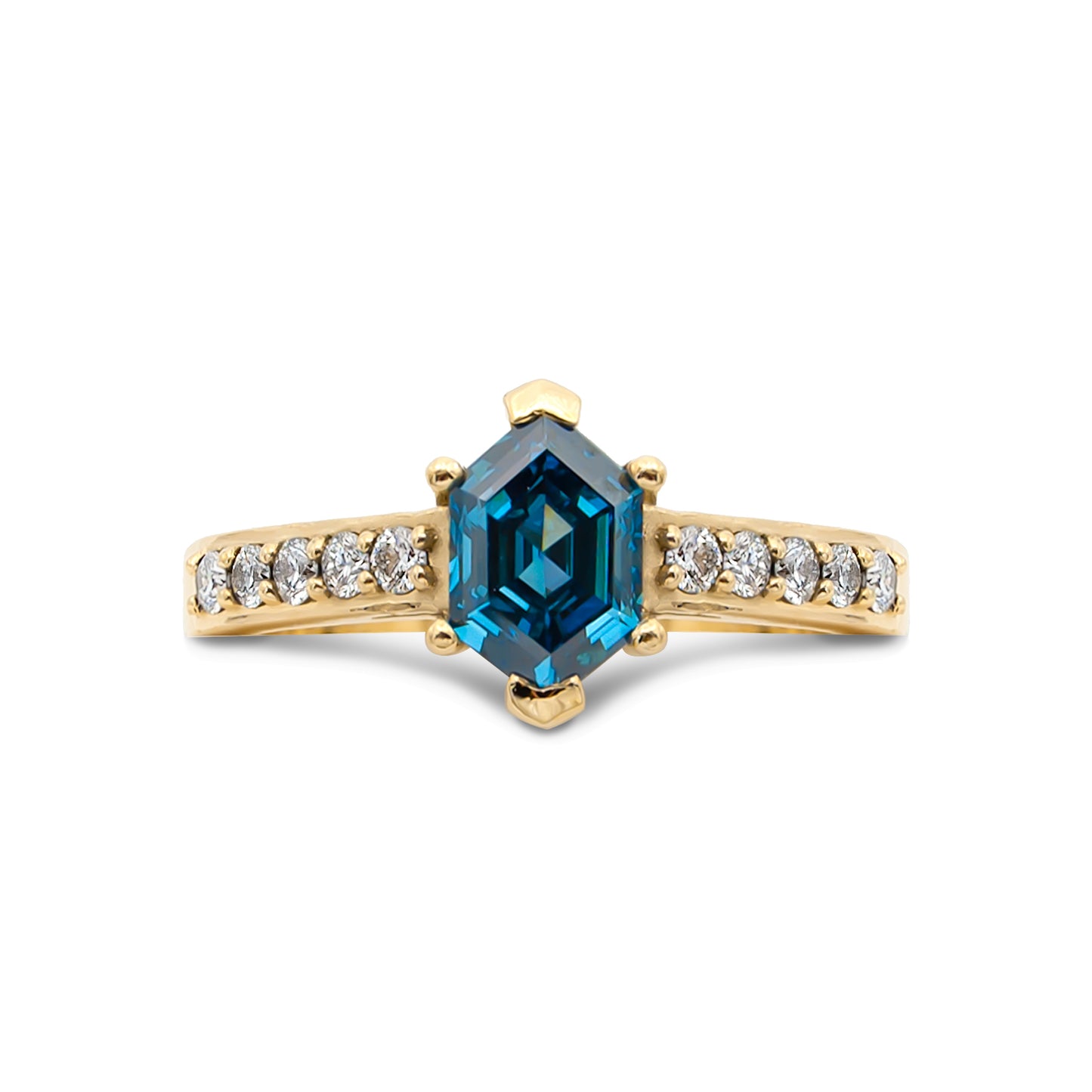 Gold ring with a blue gemstone and smaller diamonds on a white background