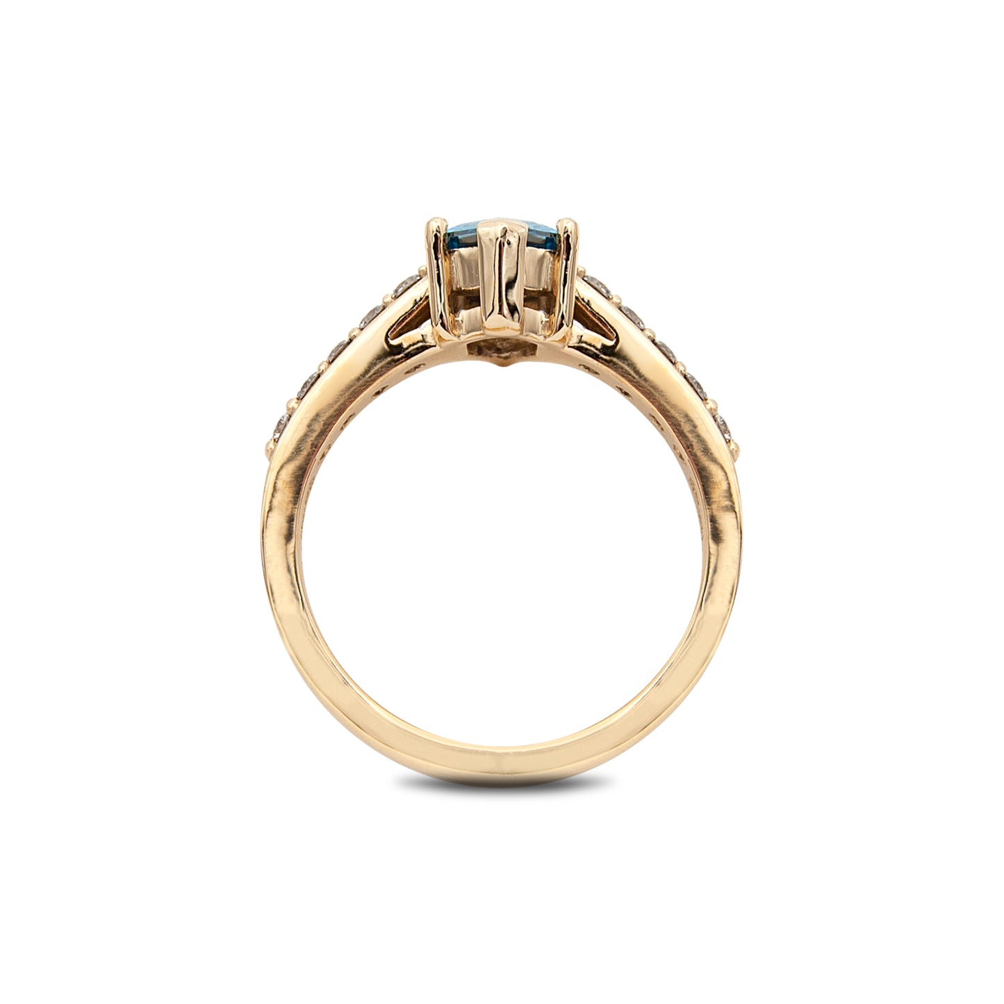 Gold ring with a central gemstone on a white background