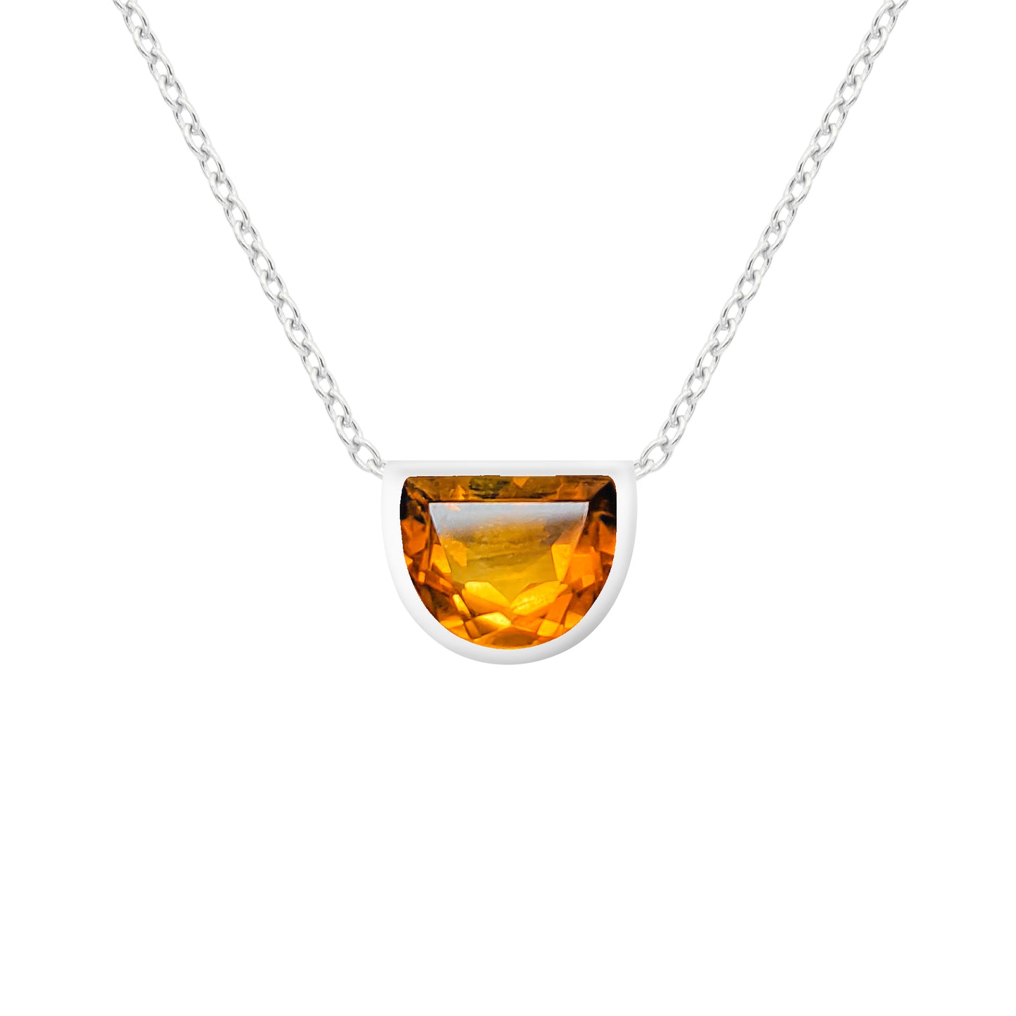 Necklace with a semi-circular citrine pendant on a white background