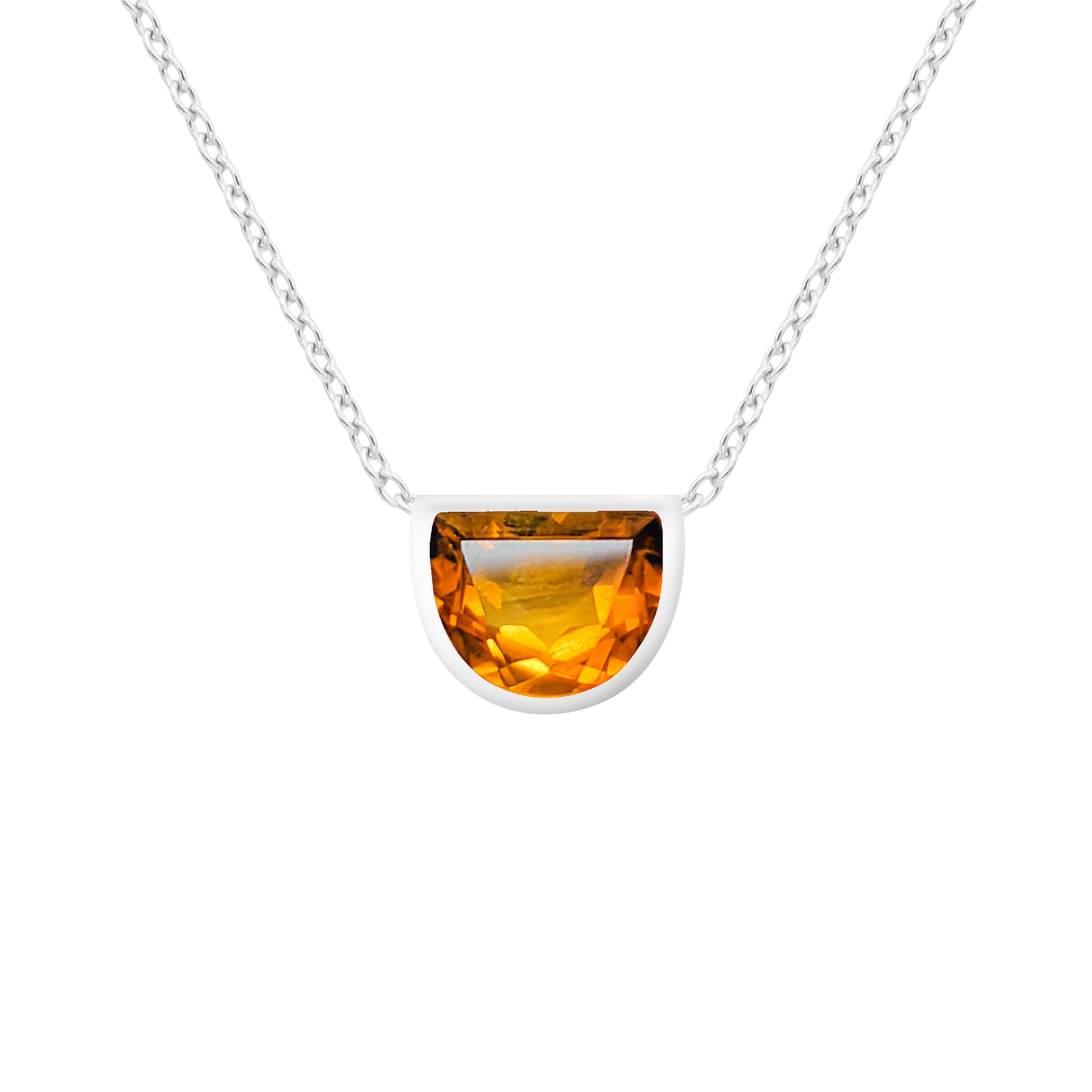 Necklace with a semi-circular citrine pendant on a white background
