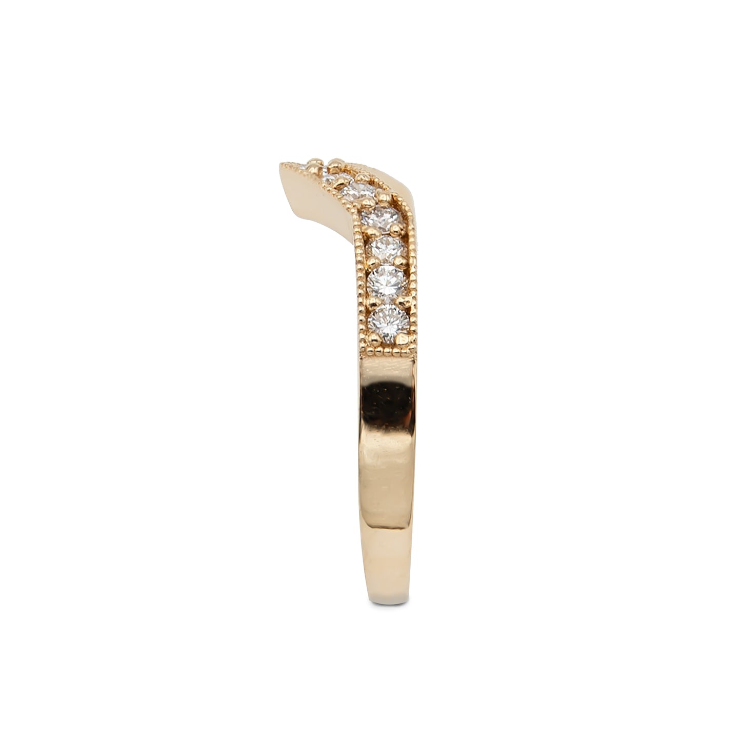 Gold ring with embedded diamonds on a white background