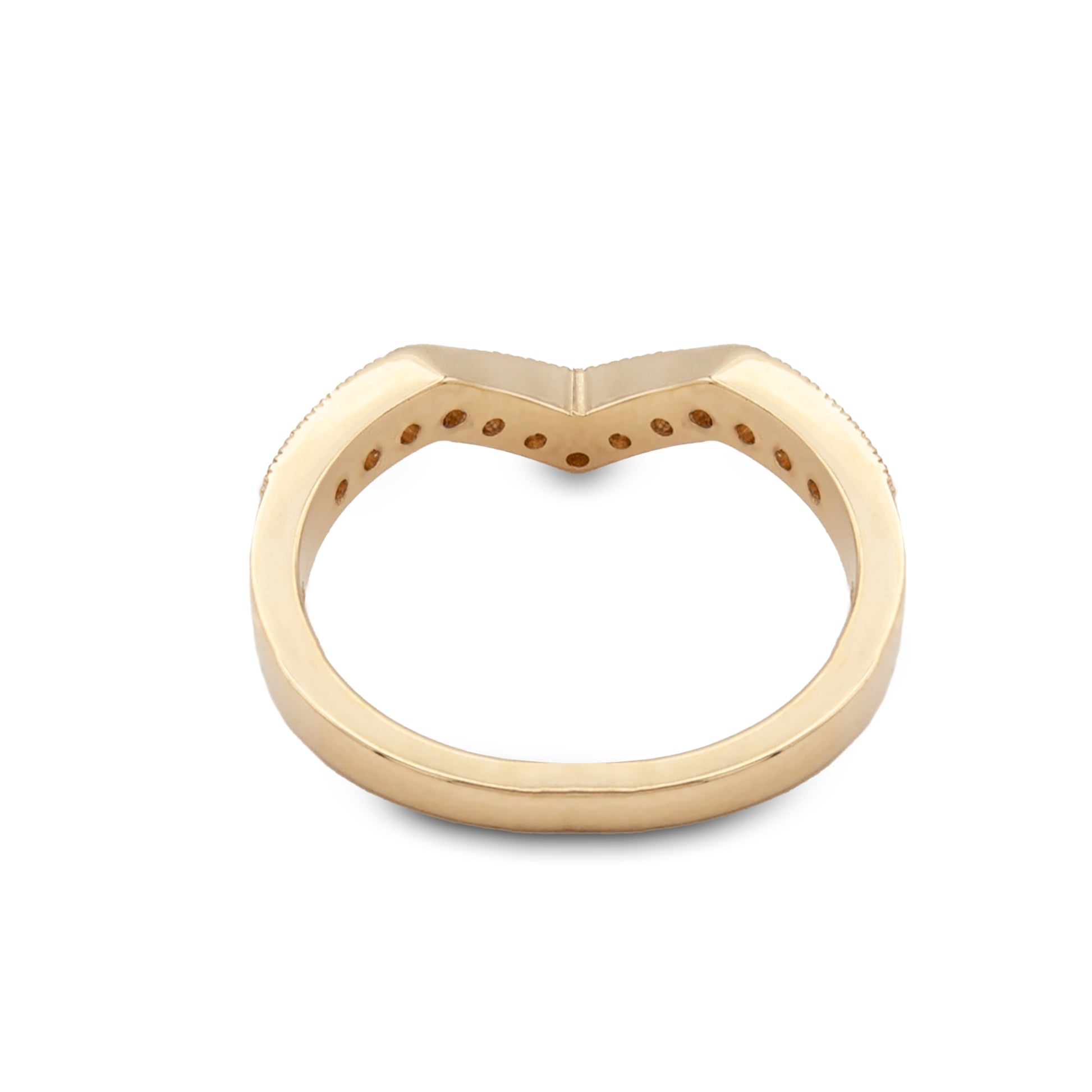 Gold ring with a unique design on a white background