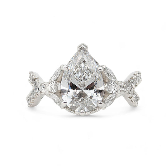 Diamond ring with a clear gemstone on a white background